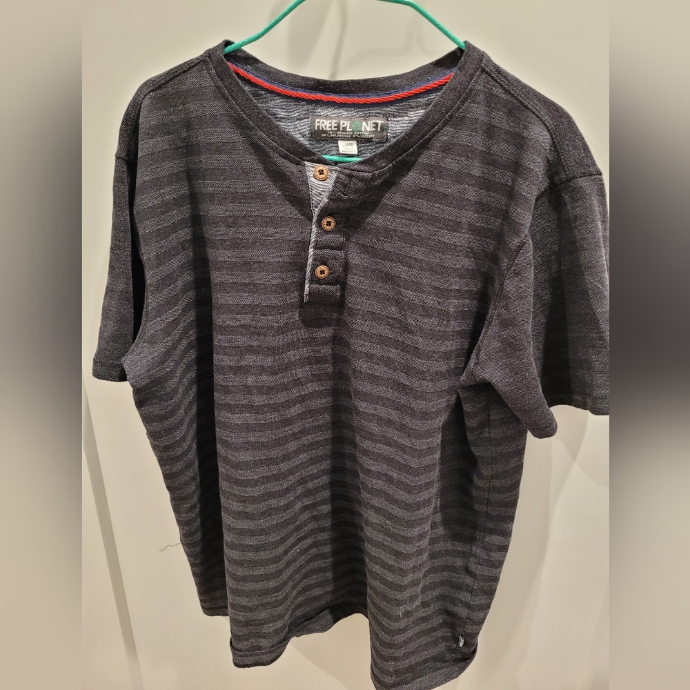 Free Planet stripped t-shirt